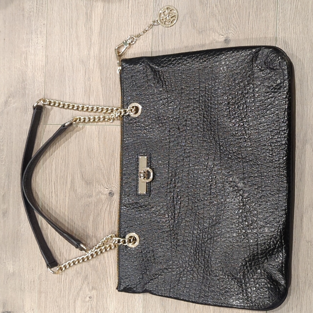 DKNY women's black leather shoulder bag.